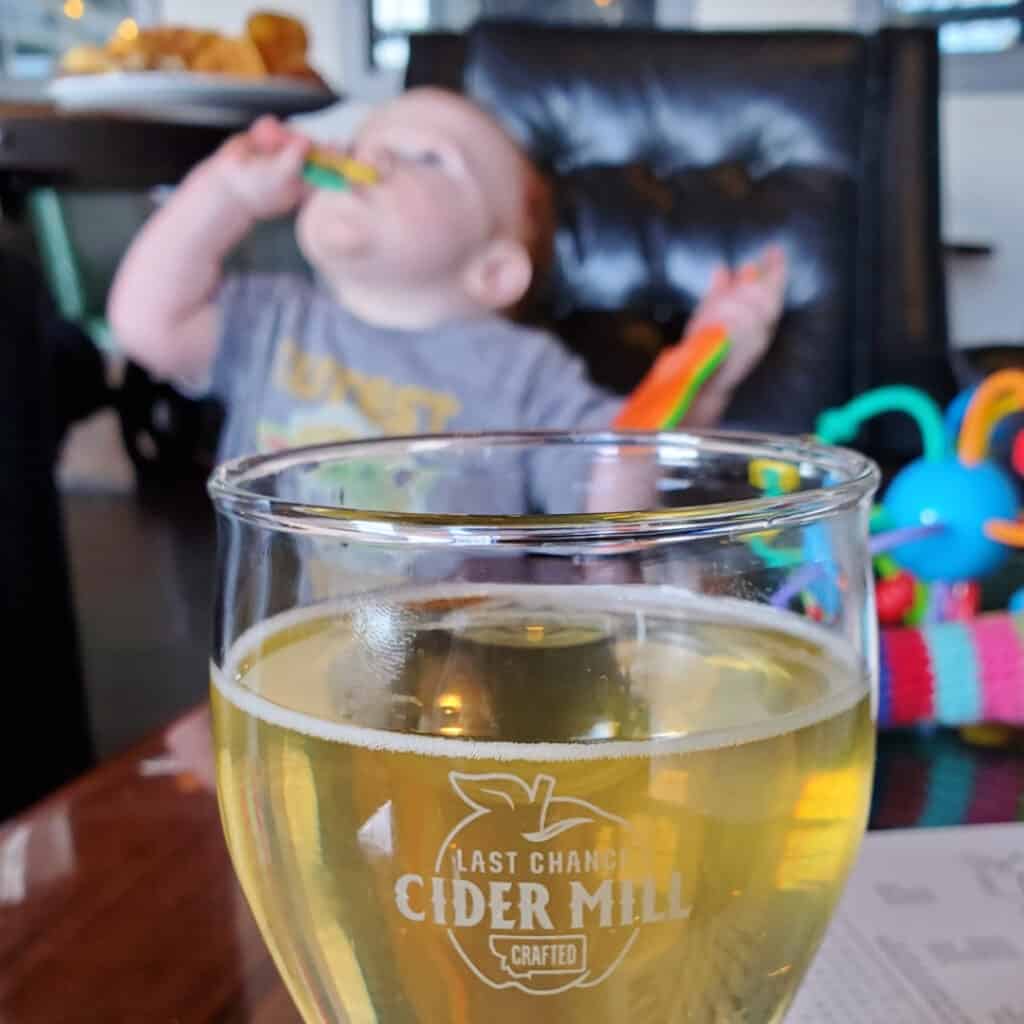 Kid friendly restaurants in Billings Montana. Toddler playing with toys at Lact Chance Pub & Cider Mill in Billings MT.